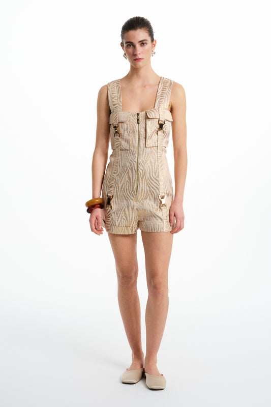 Zebra desenli, tokalı, fermuarlı krem renk mini kadın tulum